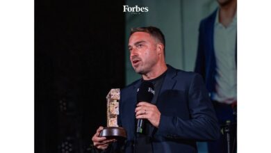 Film producer Nicola Liguori receives the “2025 Unconventional Excellence” award from Forbes during the Venice Film Festival