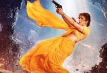 Priyanka Chopra as Mandakini from Globetrotter wields a gun in saree; first look out! : Bollywood News